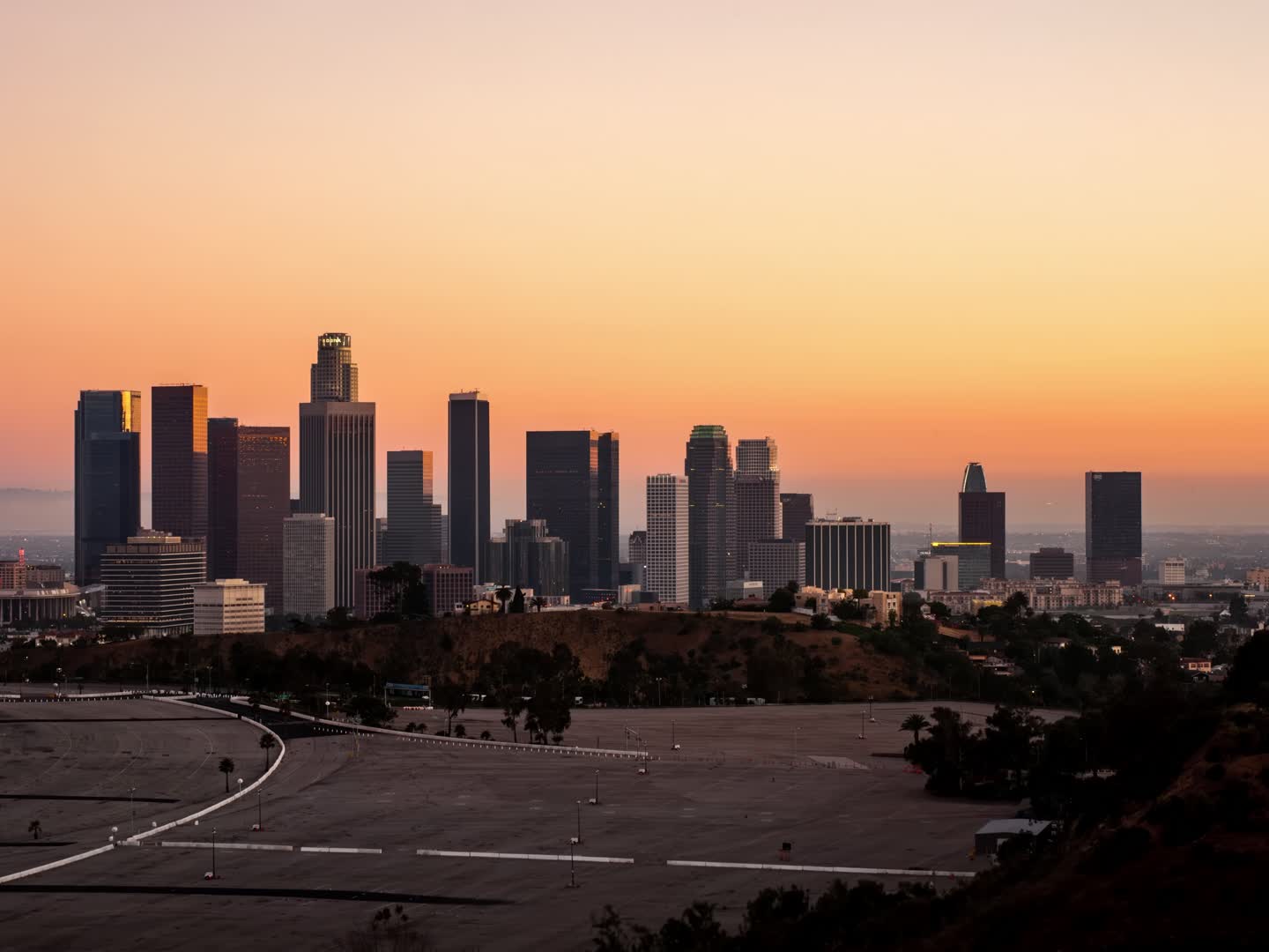 Downtown Los Angeles skyline at dusk, seen from the hills